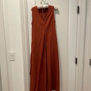 ADOLFO DOMINGUEZ -- Rust colored maxi dress, with pockets